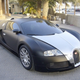 Illustration for article titled Matte Black Bugatti Veyron Soaks Up The Dubai Sun
